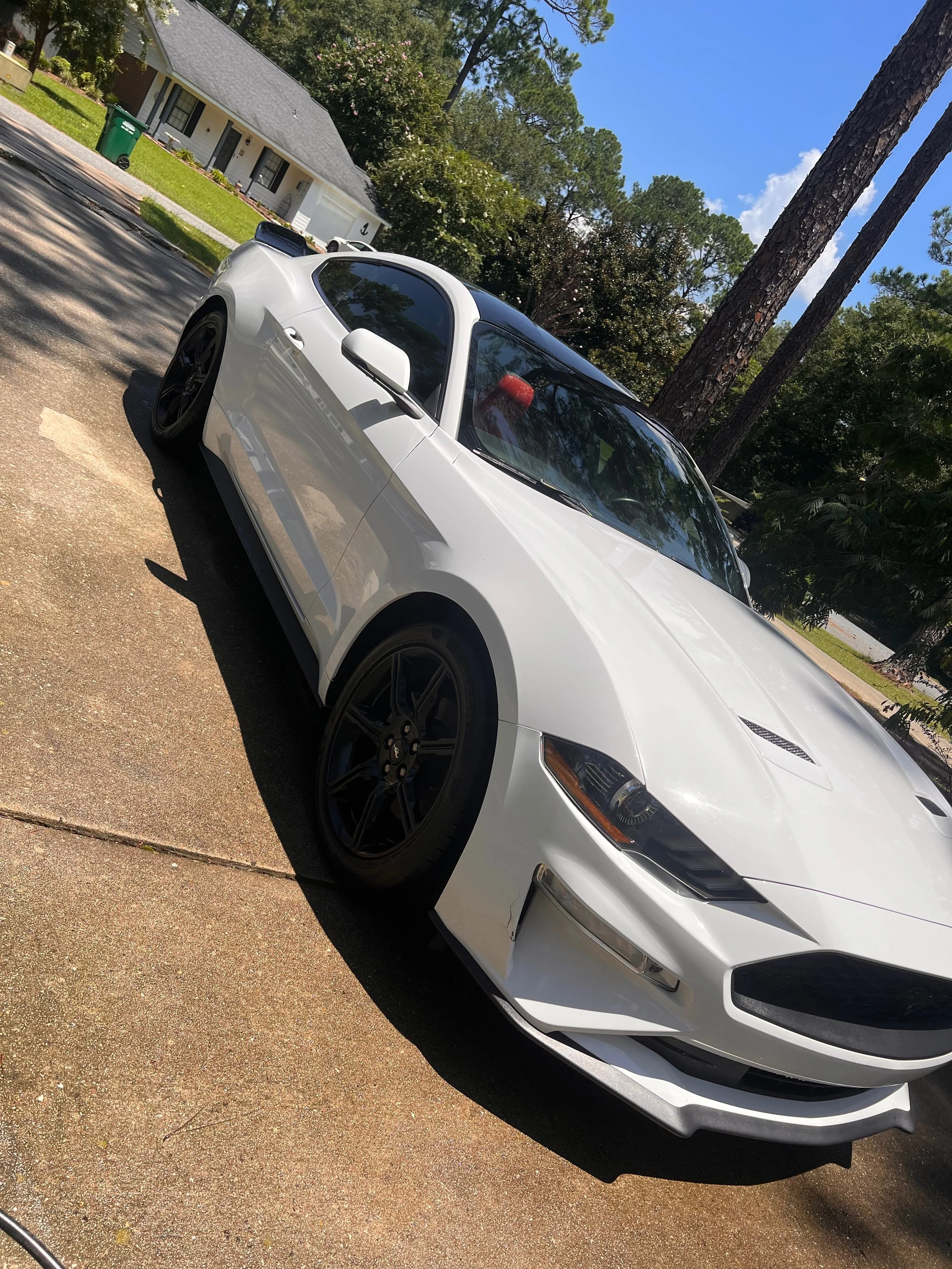 Professional exterior car detailing in South Georgia restoring vehicle paint shine with hand wash, wheel cleaning, and exterior polish in Adel, GA