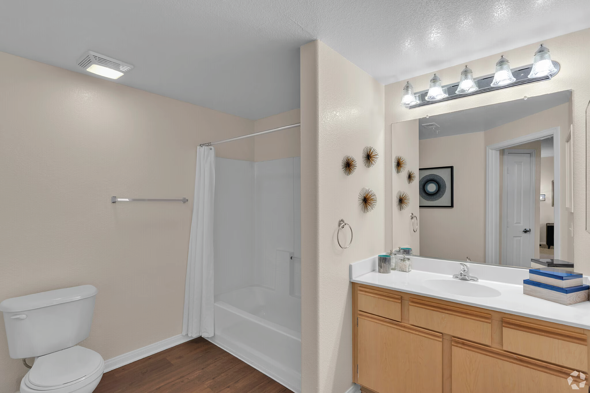 A One-Bedroom Apartment at The Enclave. This is a photo of the bathroom. 