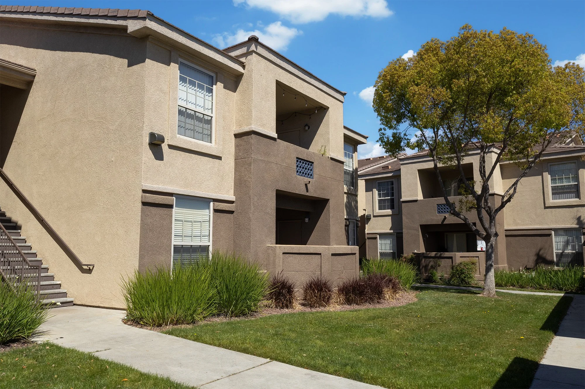 The Enclave Exterior Building in the sunlight