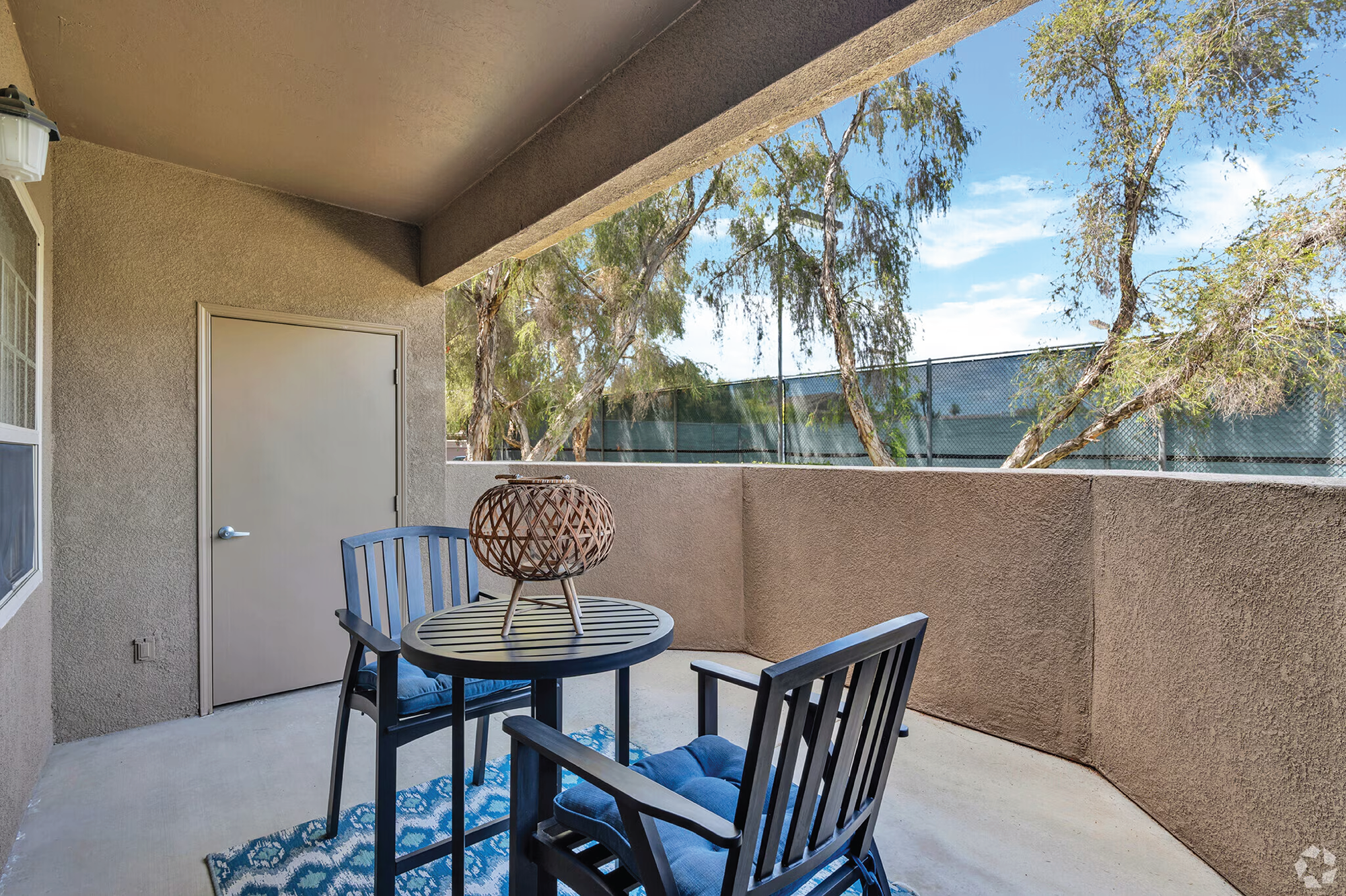 A One-Bedroom Apartment at The Enclave. This is a photo of the patio. 