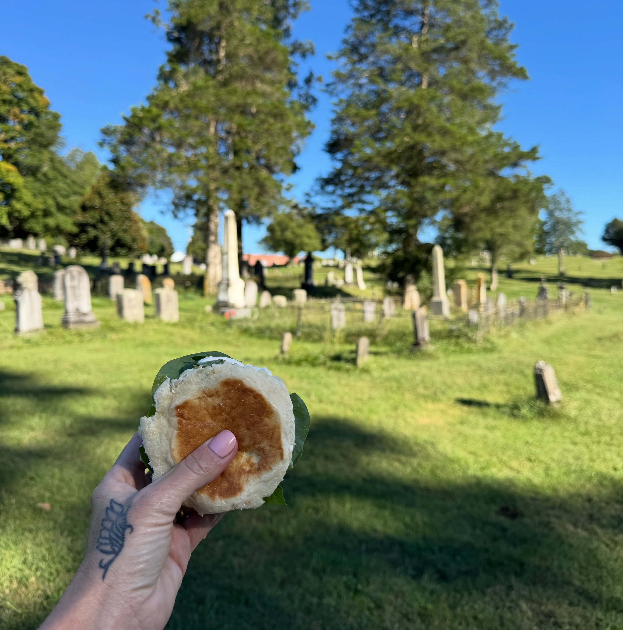 Caprese sandwiches, perfect weather, old headstones, and the crows overhead. I can&rsquo;t think of a better place for a picnic. 🐦&zwj;⬛