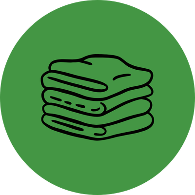 Stack of folded towels or cloths inside a green circular background.