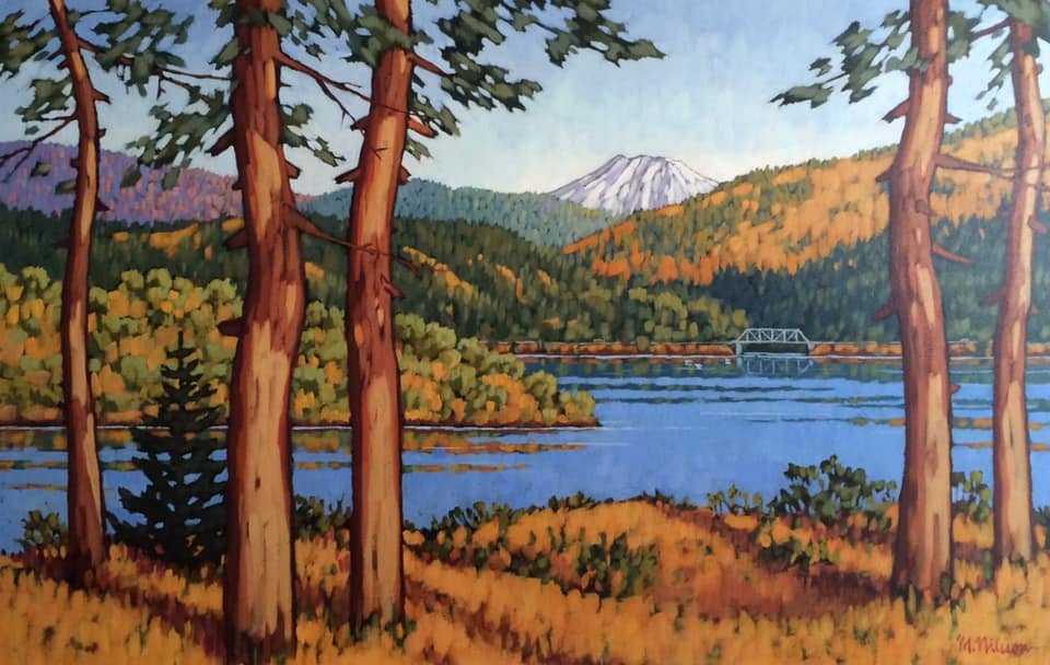 A painting of a lakeside scene with trees in the foreground, colorful autumn foliage on rolling hills, a mountain in the background, and a bridge crossing the water. Mark Nilsson ©