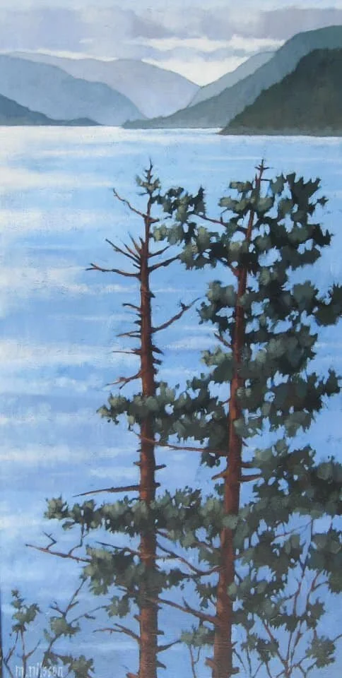 A painting of a lake surrounded by mountains with two pine trees in the foreground. Mark Nilsson ©