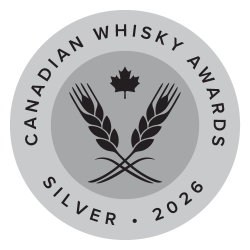 Canadian Whisky Awards Silver 2026 logo with a maple leaf and crossed wheat stalks.