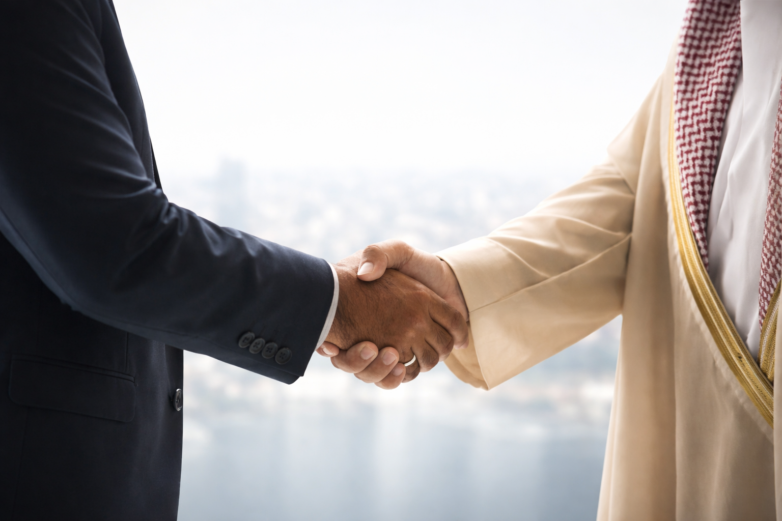 Two people shaking hands, one in a dark suit and the other in traditional Middle Eastern attire, with a cityscape in the background.