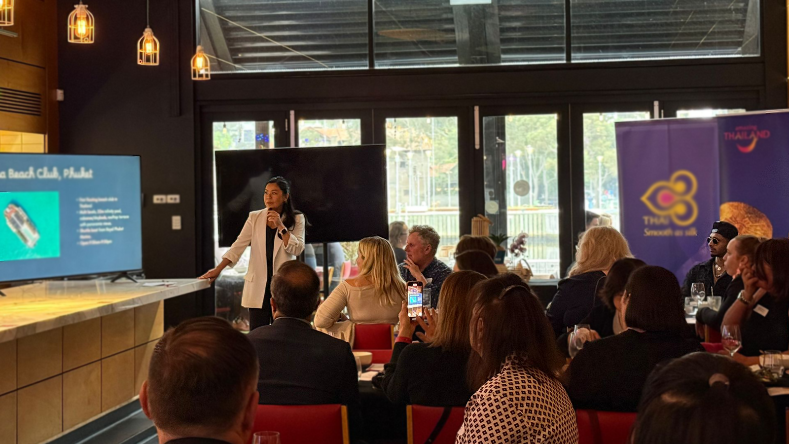 Private dining event with a presentation