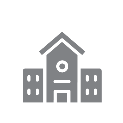 Gray icon of a building with a clock, resembling a town hall or government building, flanked by two smaller rectangular buildings.