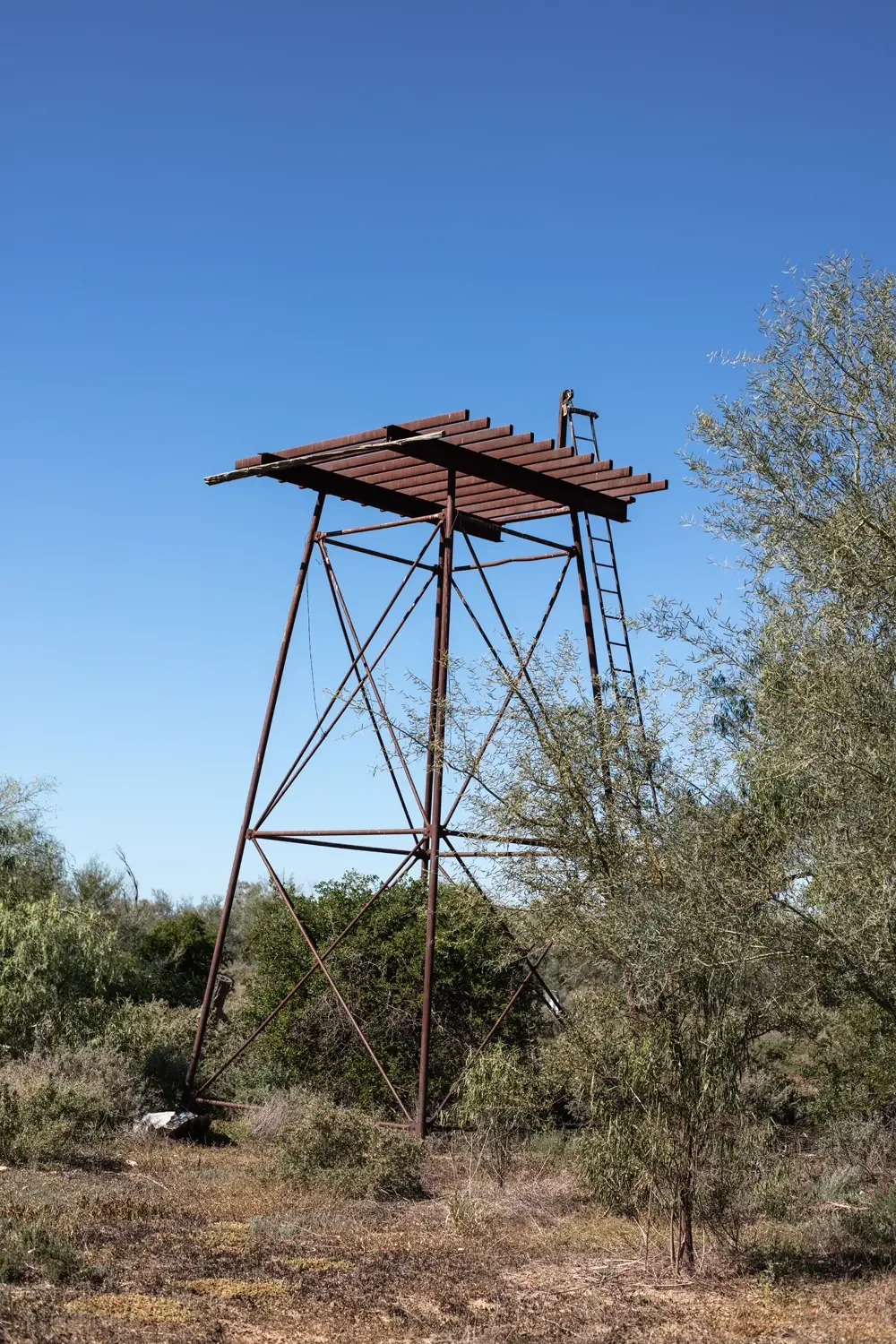 tower with flat corrugated panel at the top. 