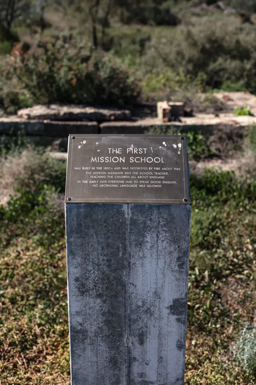the first mission school sign