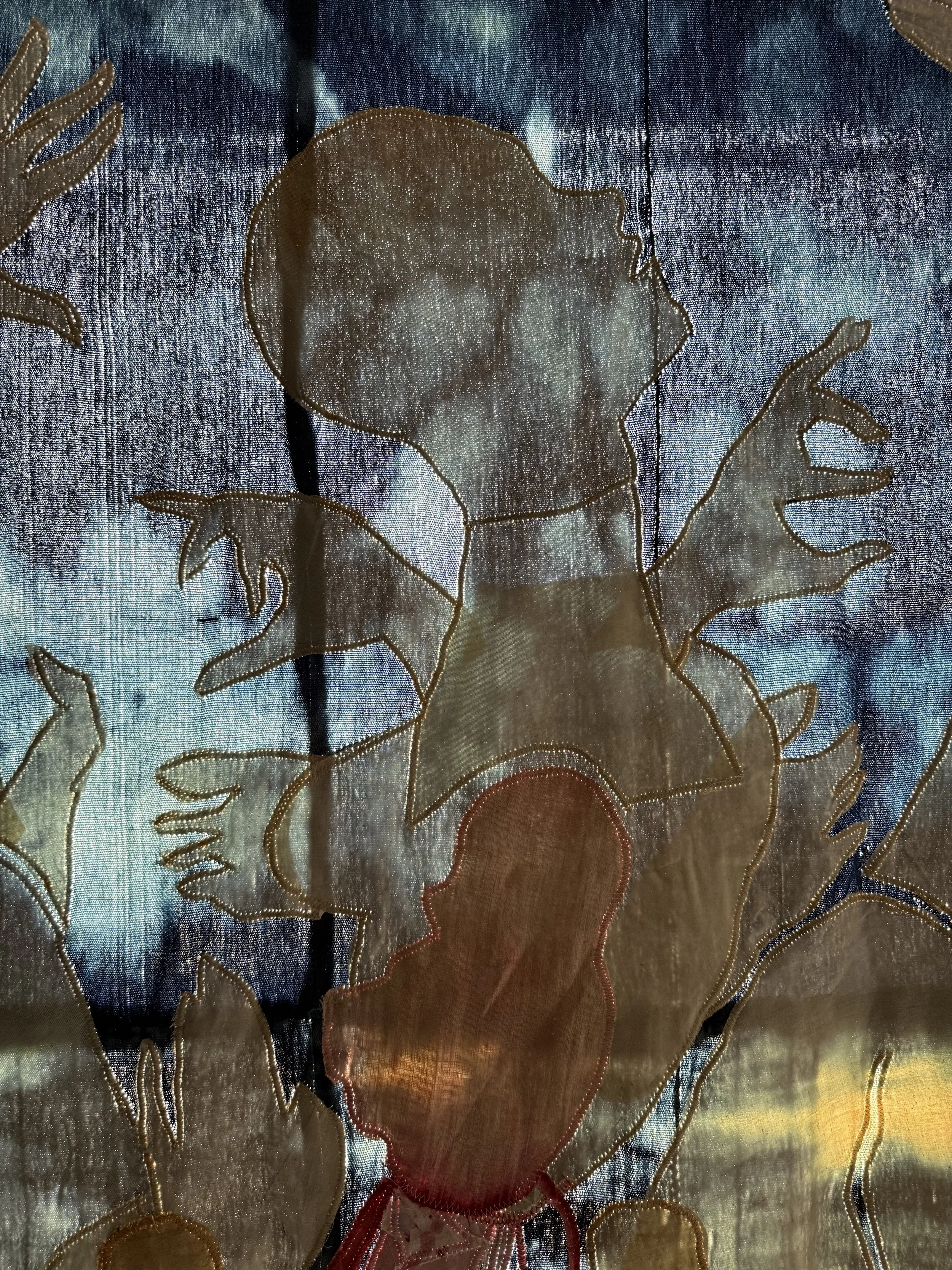 "Blue Mama" (2026) (Detail, Evening Light) 57" x 50" Muslin, cotton, coffee, cochineal dye, fabric relief print on bleached indigo shawls 