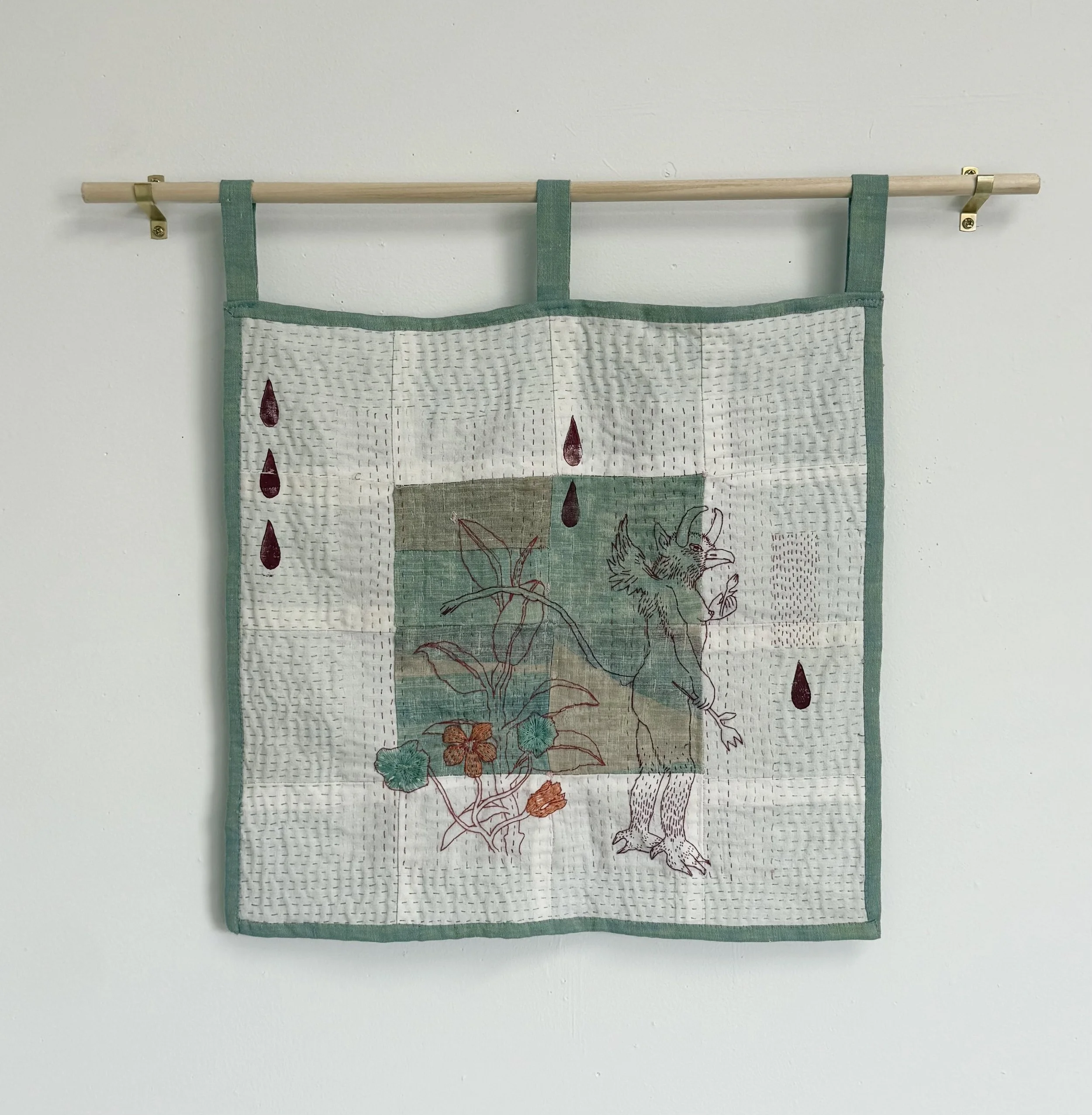 "Griffin, Ficus Elastica, Nasturtium, Blood Drops" (2025) 12" x 12" recycled linen on cotton with hand embroidery and linocut additions, quilted by hand  $1800