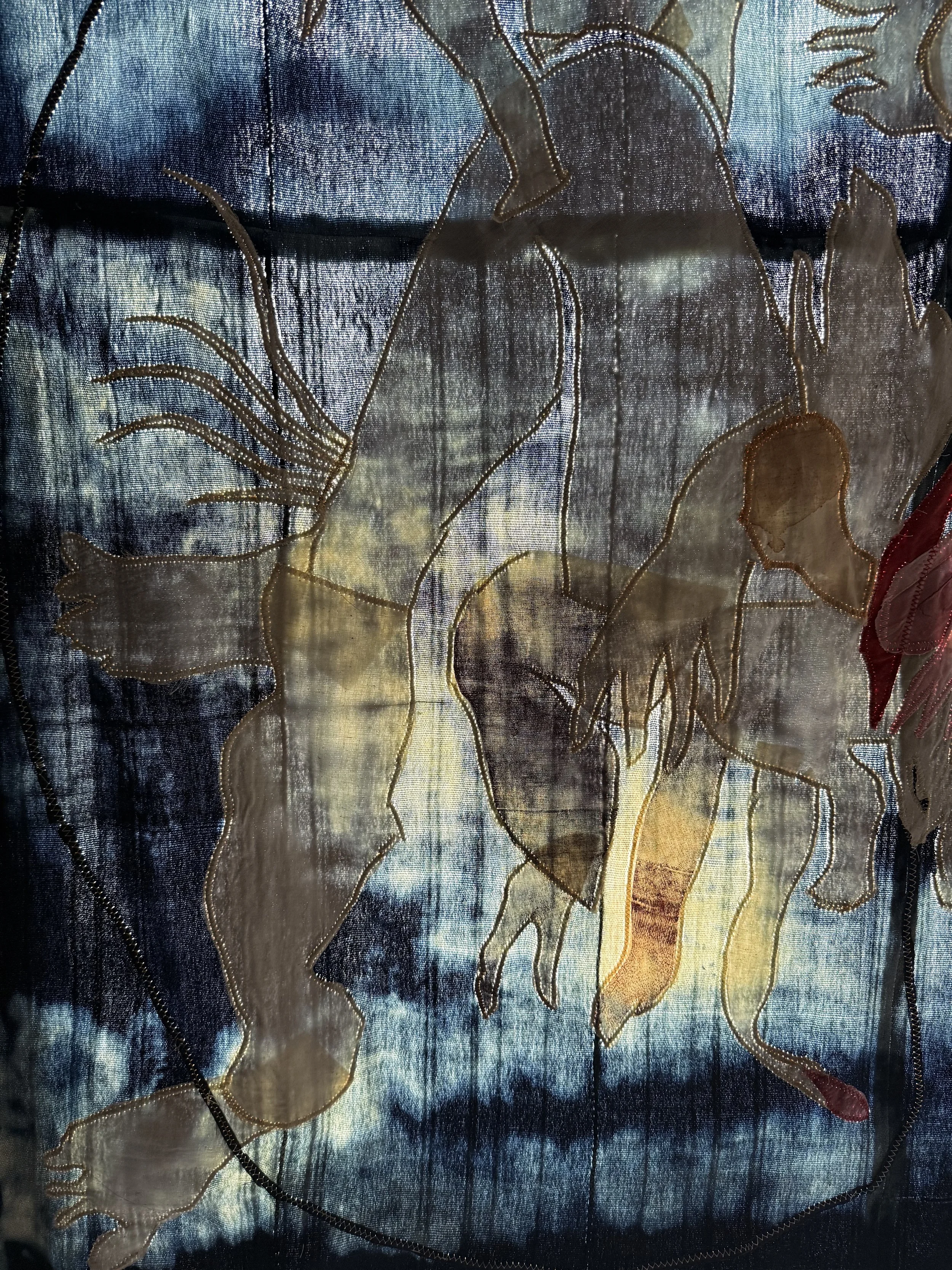 "Blue Mama" (2026) (Detail, Evening Light) 57" x 50" Muslin, cotton, coffee, cochineal dye, fabric relief print on bleached indigo shawls 
