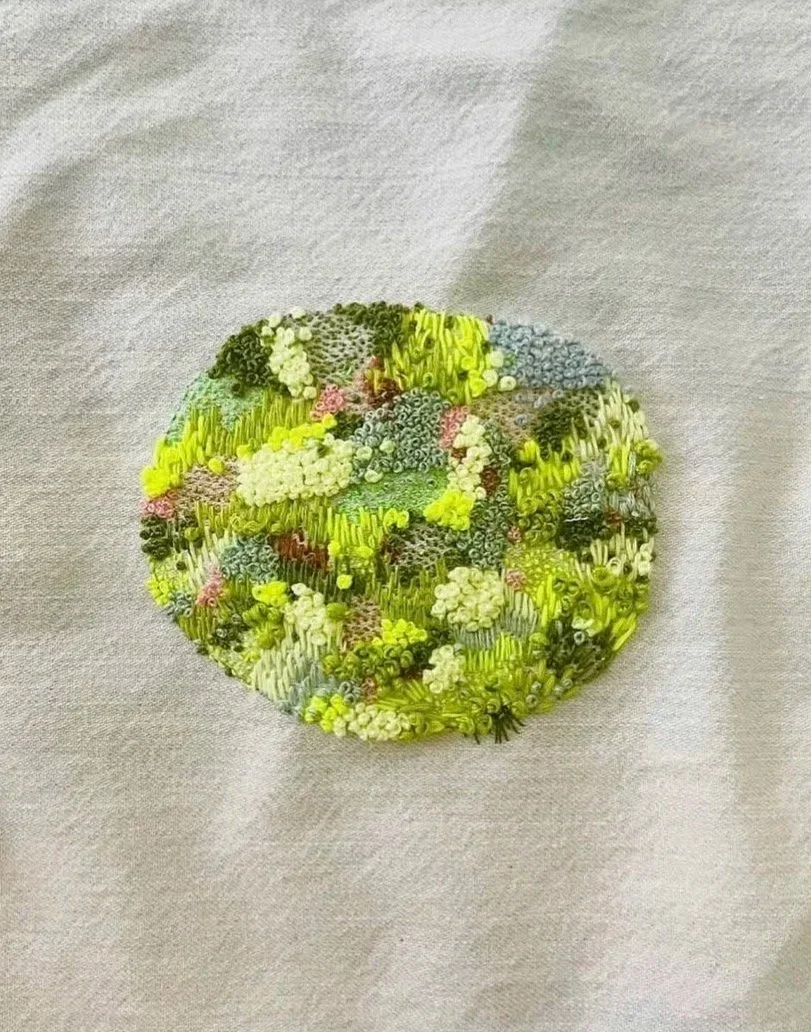 "Lichen Patch" (2025) 6.5" x 5"  hand embroidery on bleached denim. SOLD