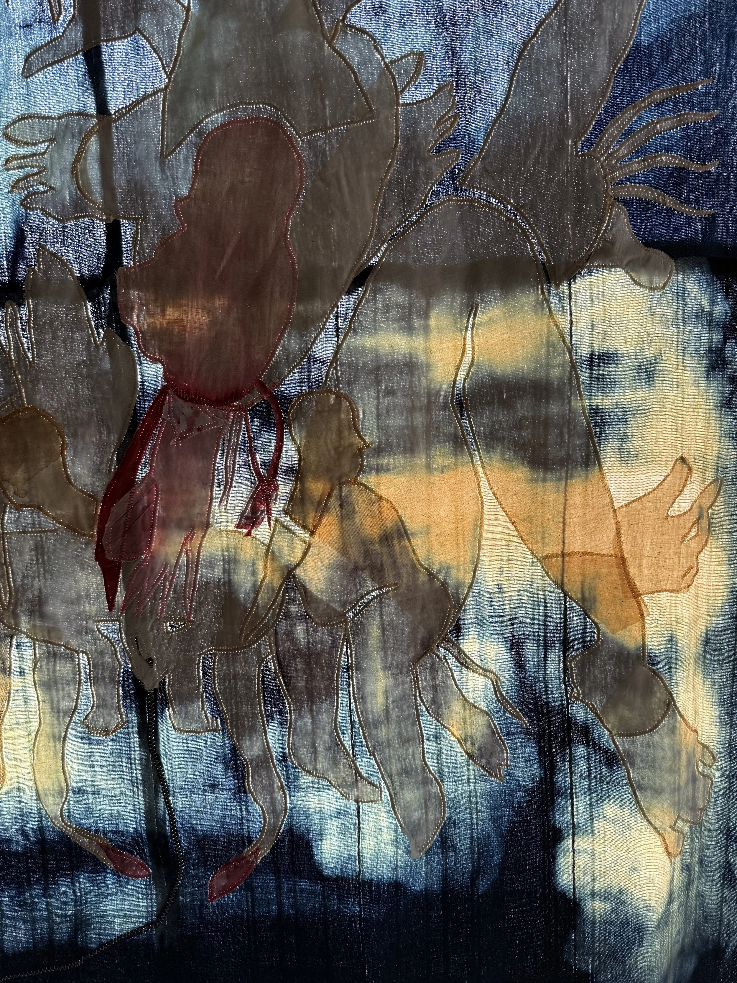 "Blue Mama" (2026) (Detail, Evening Light) 57" x 50" Muslin, cotton, coffee, cochineal dye, fabric relief print on bleached indigo shawls 