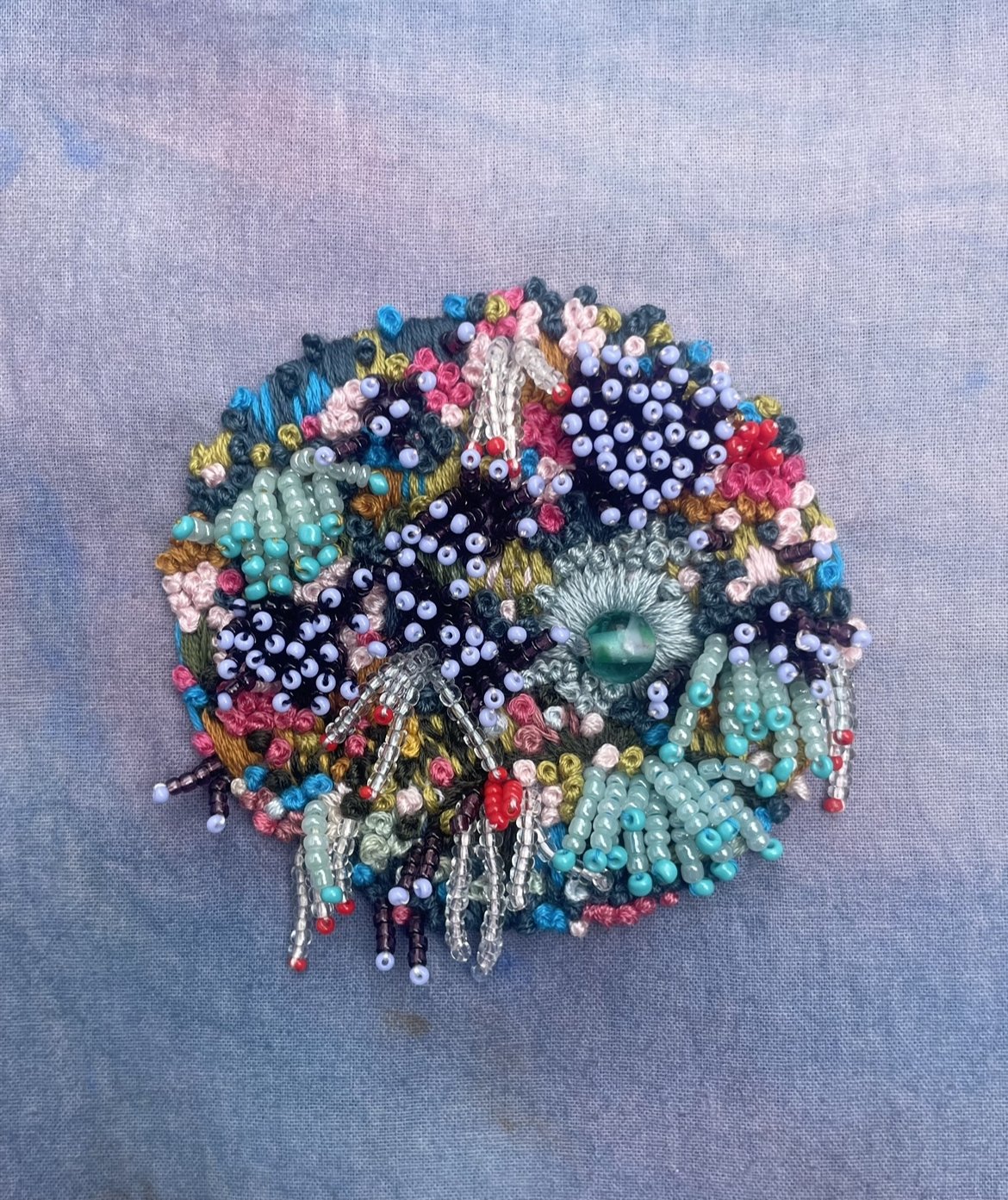 "Fairy Spores" (2024) 5" x 5" hand embroidery and beading on hand painted cotton. SOLD