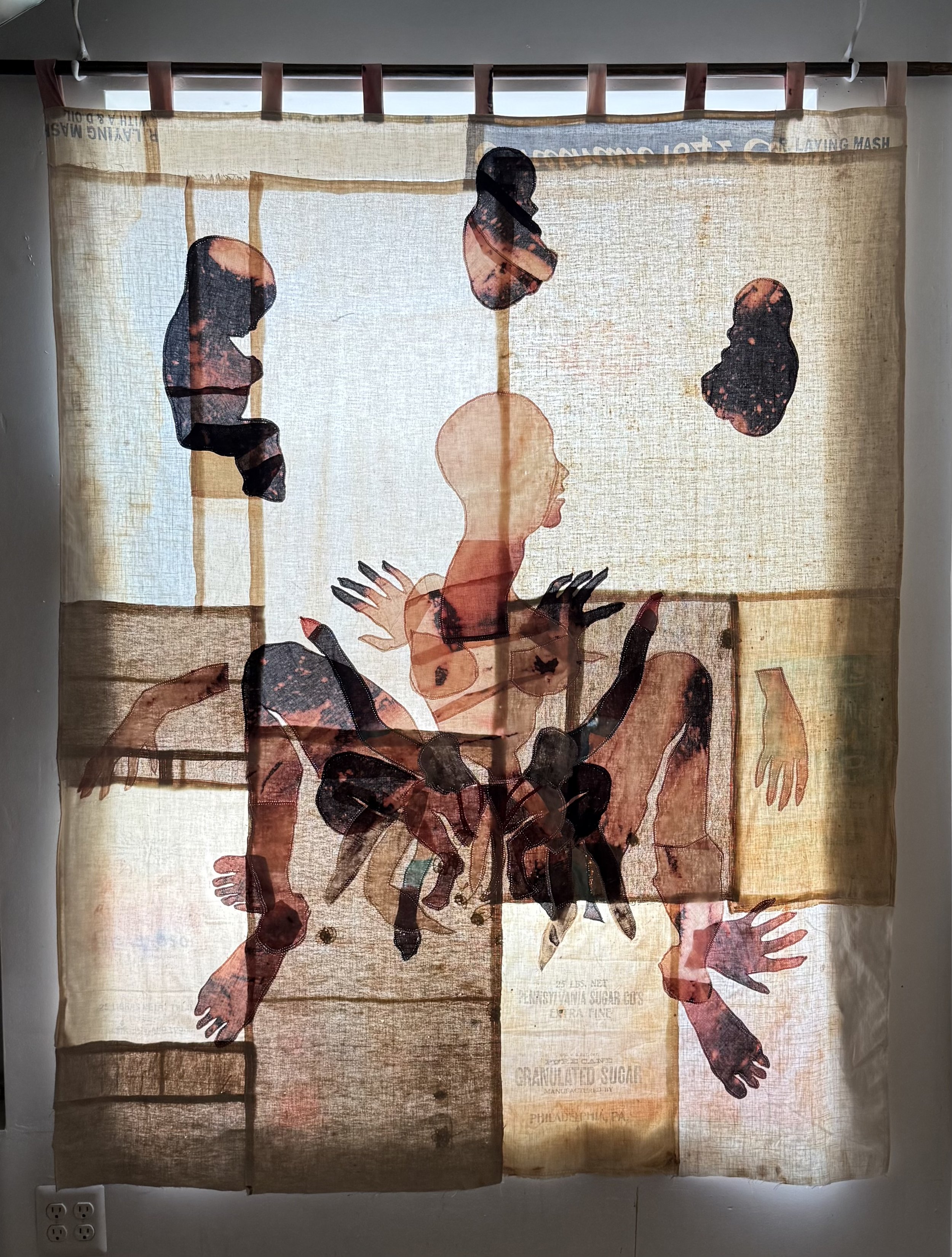 "Cecilia" (2026) (in evening light) 70" x 57" Bleached bedsheets, coffee, fluid watercolor, relief prints, used feed, seed and soap sacks, hand embroidery, $9,000