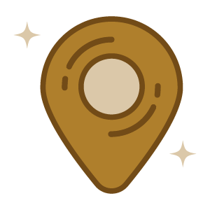 Map pin icon with two stars surrounding it.