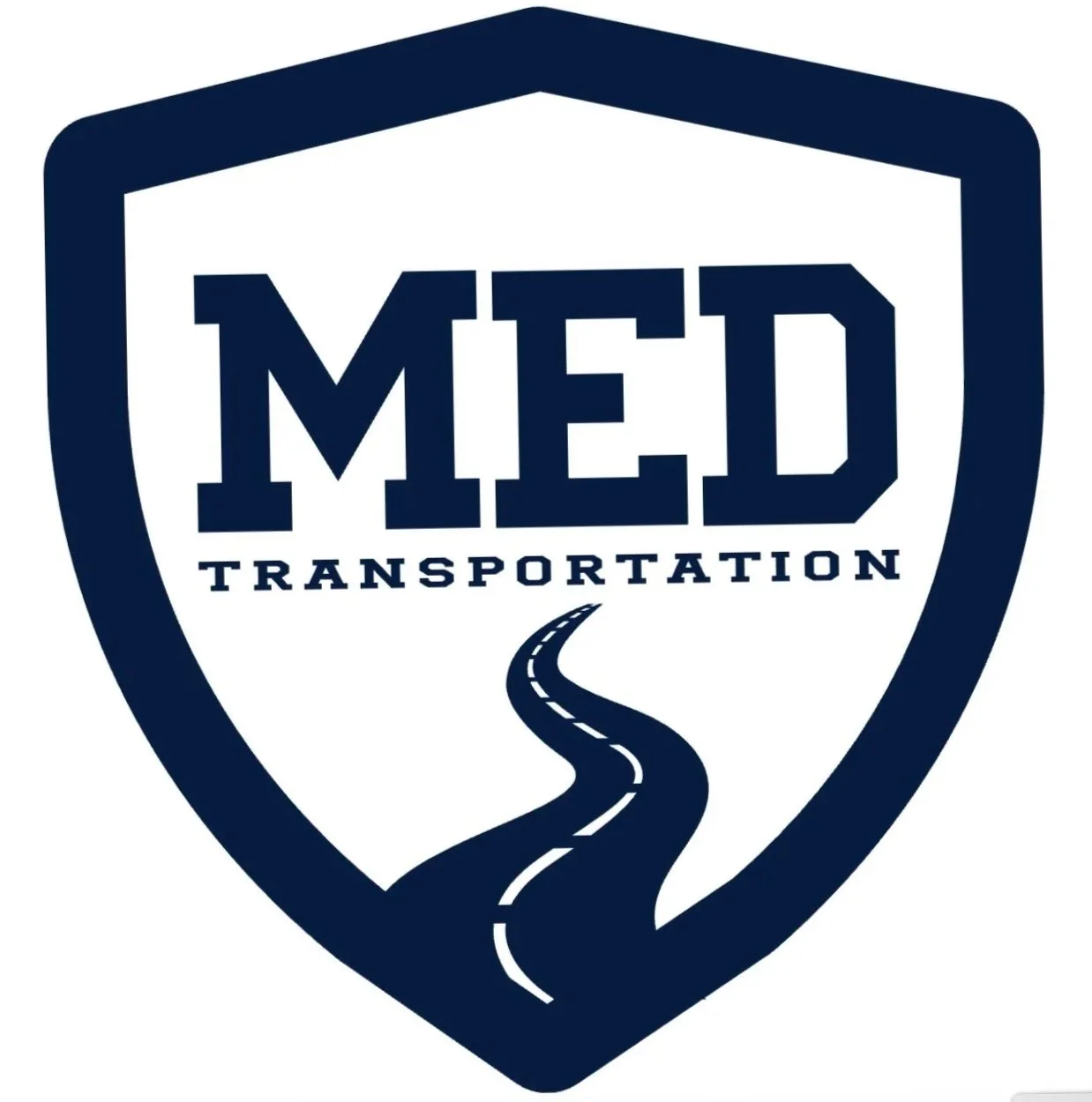 The logo of MED Transportation, featuring a shield shape with a road leading into the distance.