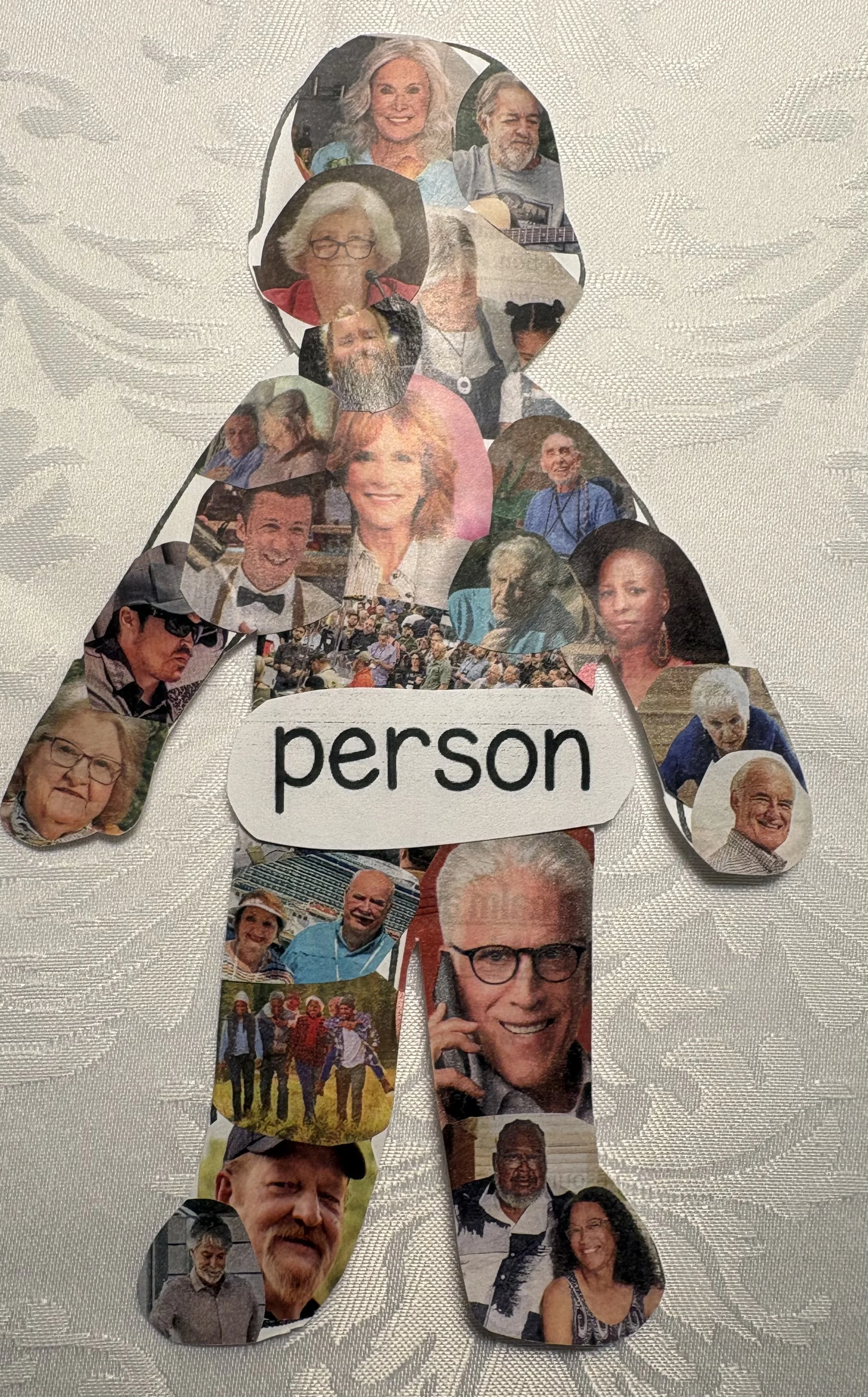 A collage in the shape of a person, made of various photographs of different individuals, with a sign that says 'person' in the middle.