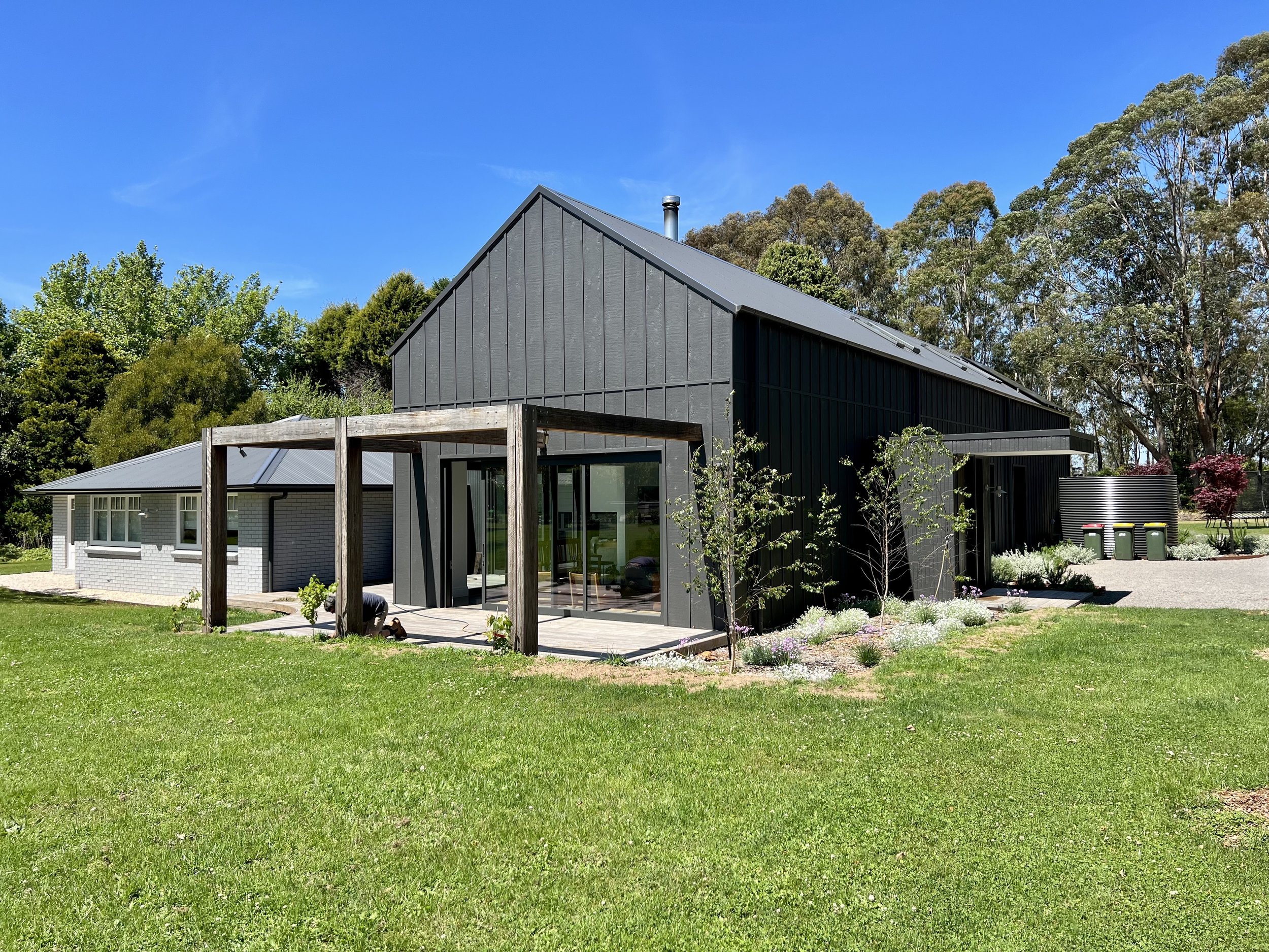 Modern barn-style home exterior in the Southern Highlands built by Baltimore Constructions