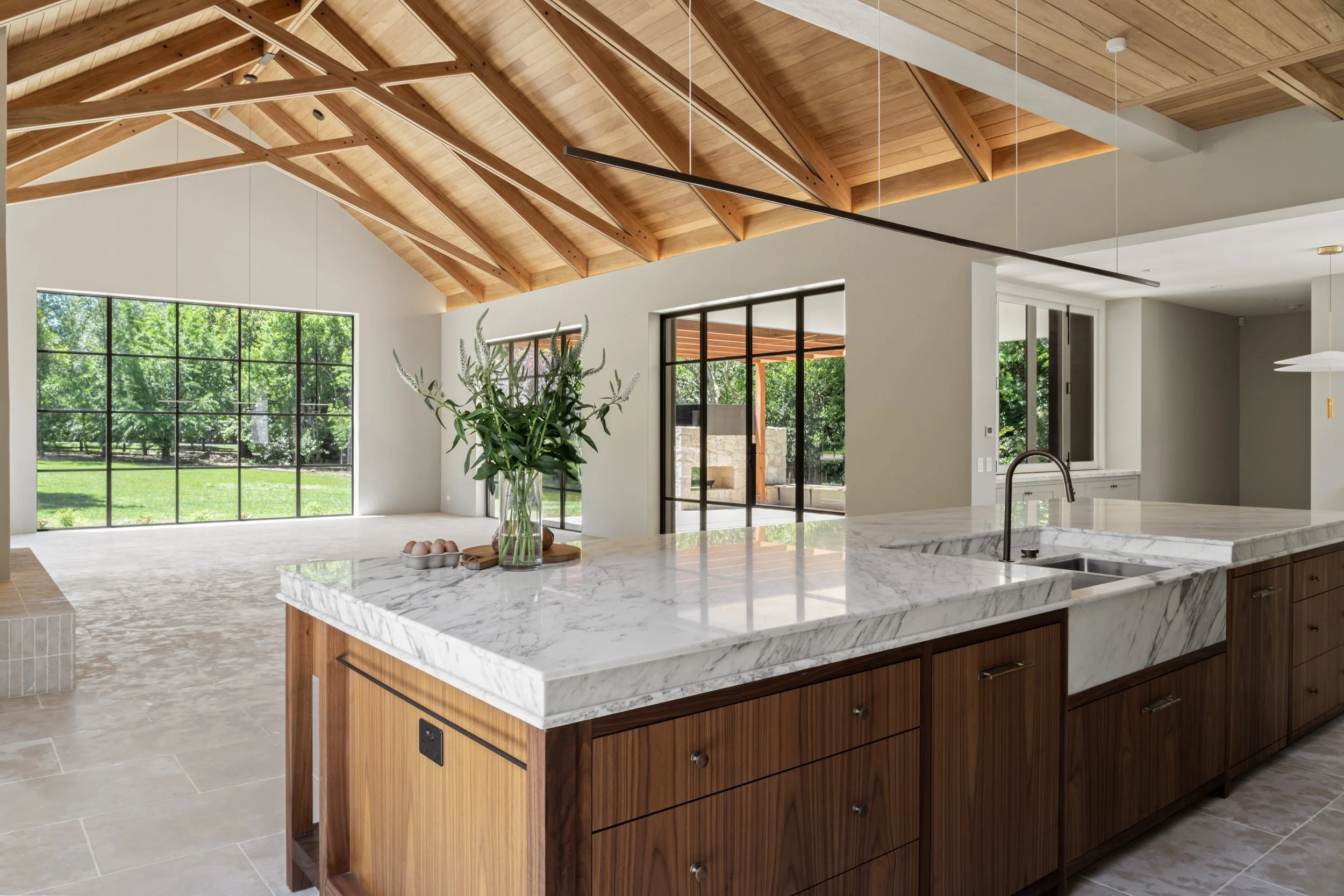 Open plan kitchen and living space in a Southern Highlands home built by Baltimore Constructions