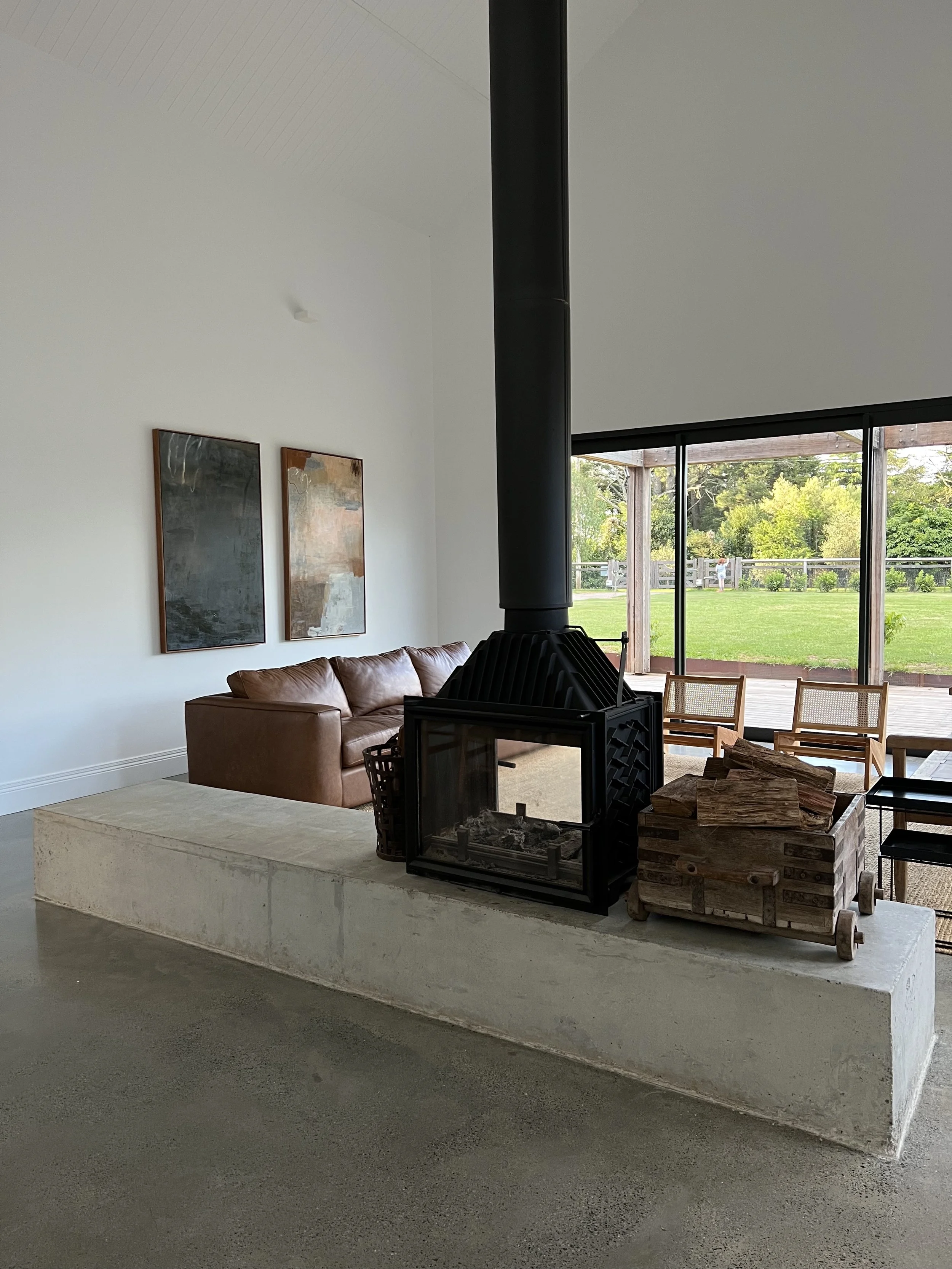 Living room with fireplace in a Southern Highlands home built by Baltimore Constructions