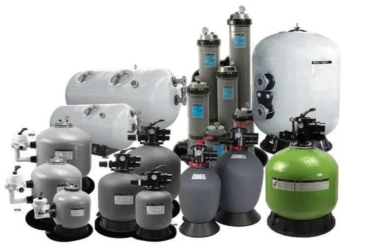 Collection of various water filter tanks and filtration equipment.
