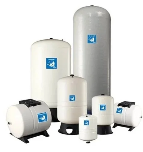 Collection of various white water pressure tanks with blue labels.