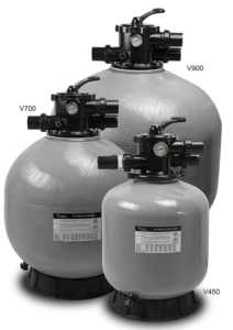 Three water softener tanks with control valves on top, used in water treatment systems.