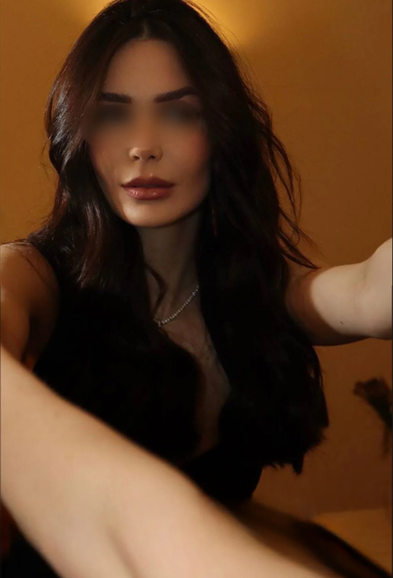 High-end escort in New York City, brown-haired and fair-skinned, available for incall and outcall bookings