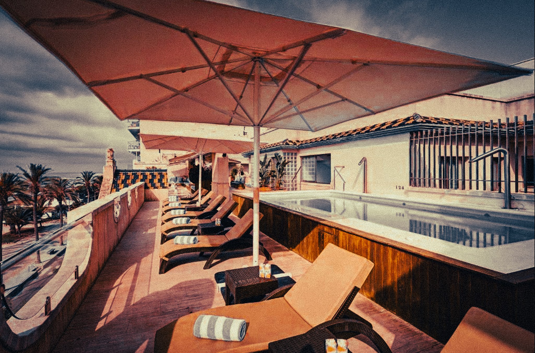 Rooftop pool and terrace at a beachfront hotel in Sitges.
