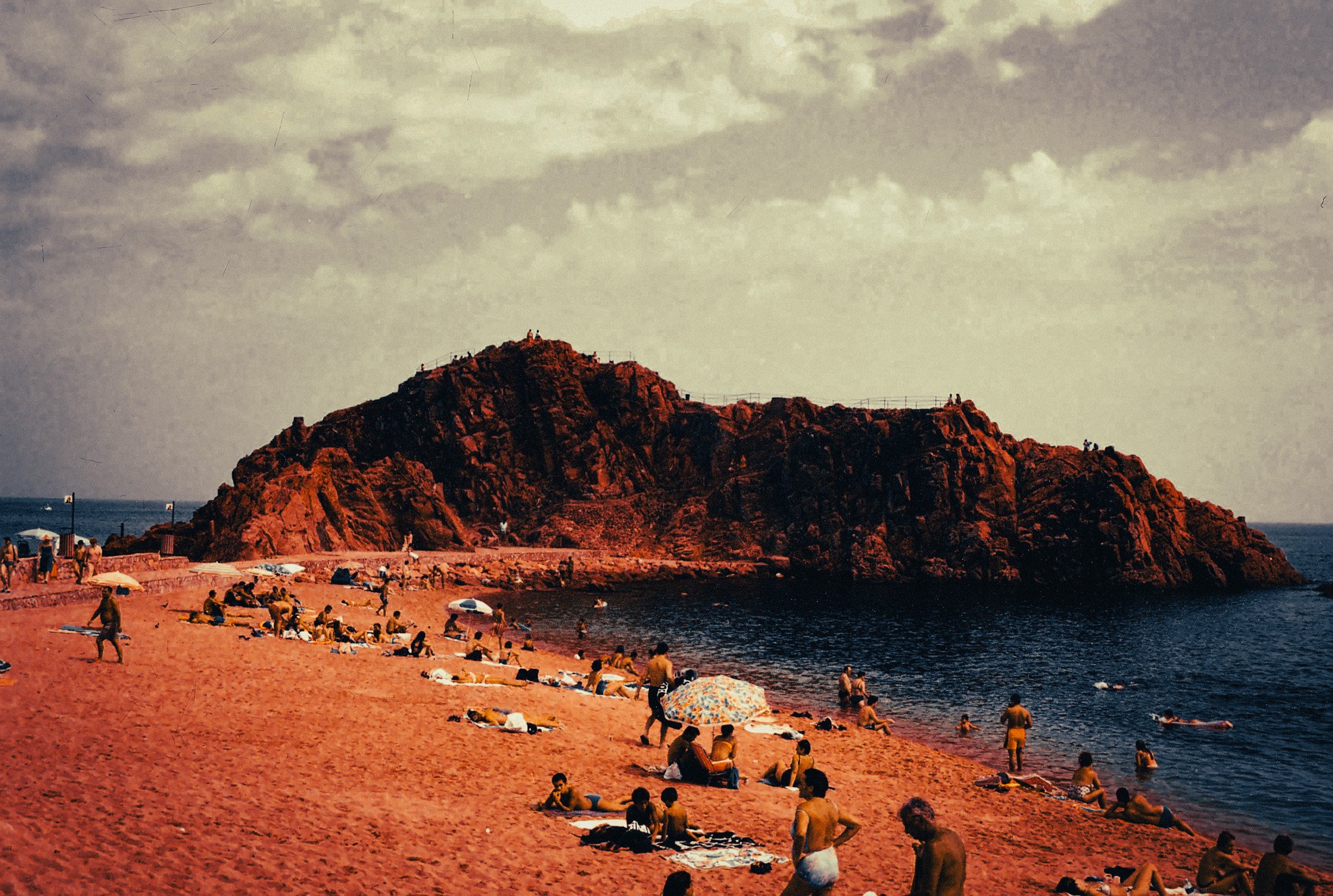 Blanes beach and rocky coastline on the Costa Brava, an easy coastal day trip from Barcelona by car or train.