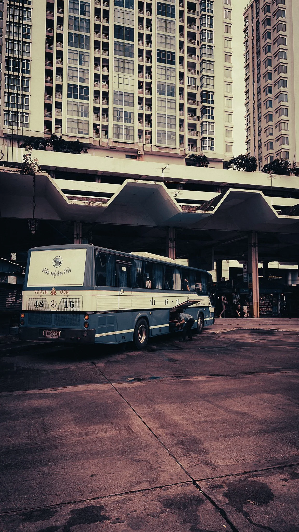 Bus waiting at Phuket Bus Terminal before travelling to Khao Sok, Thailand.
