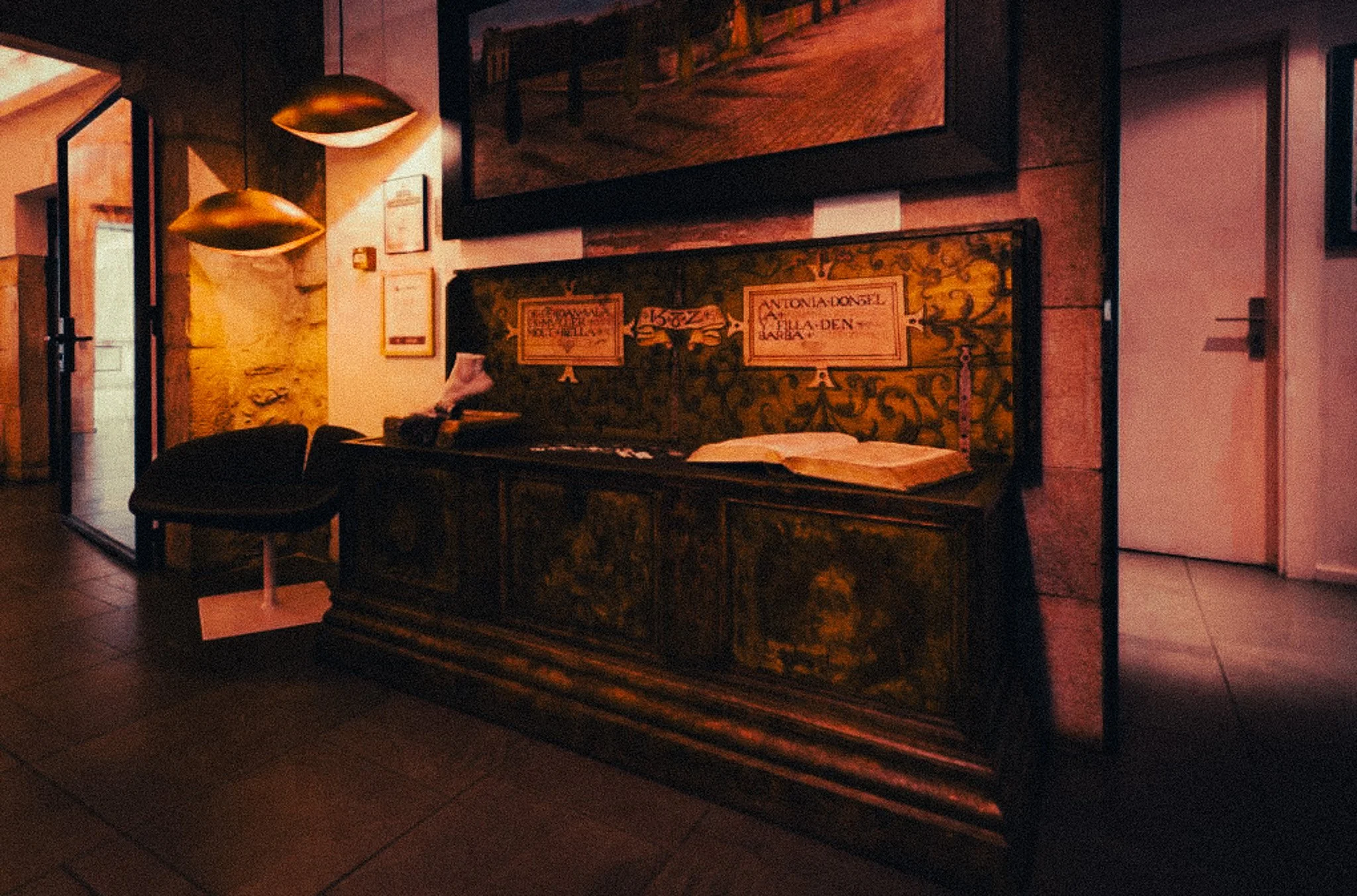 Atmospheric historic hotel interior near Girona Cathedral.