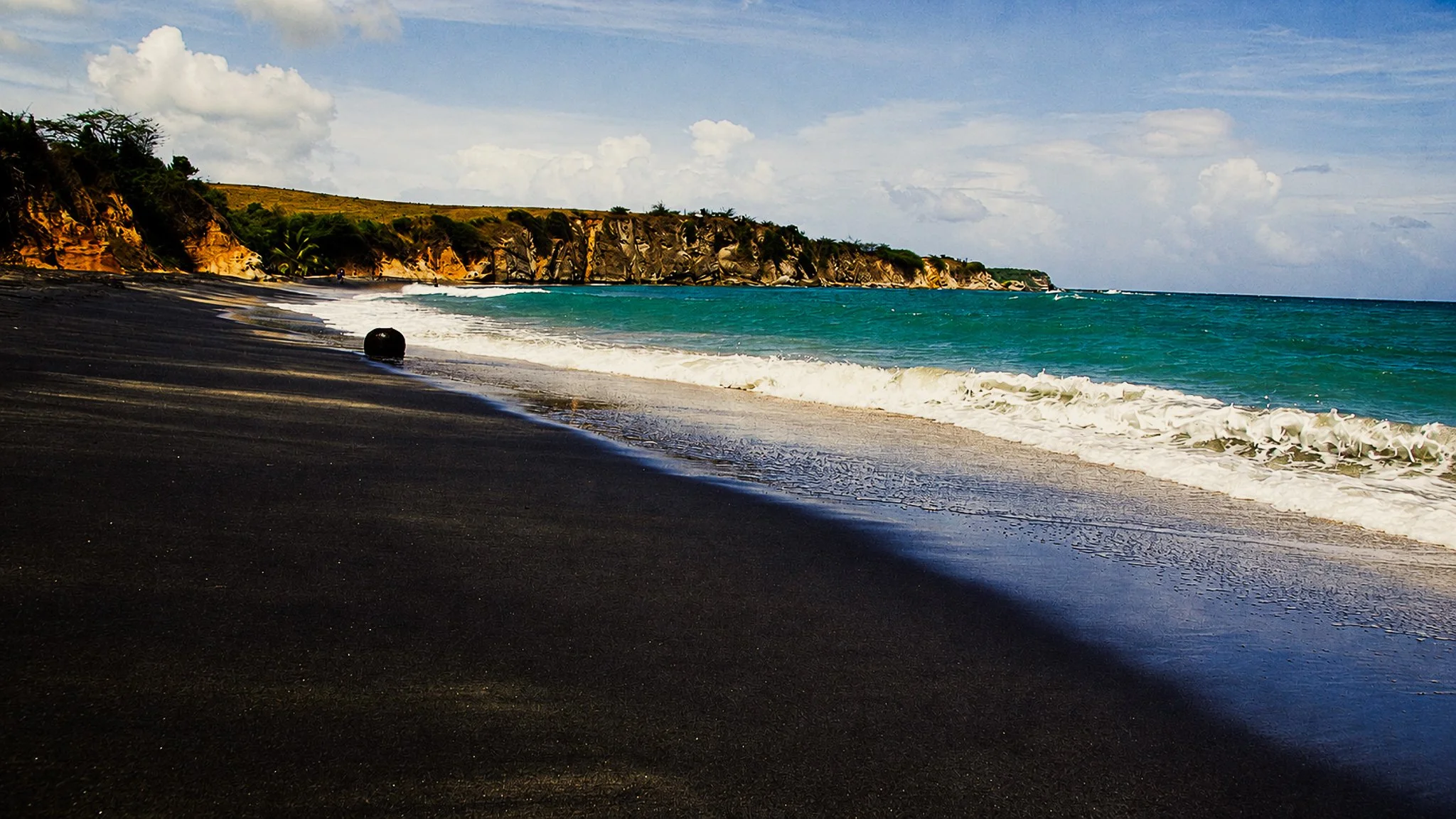 Black sand beach and turquoise sea at Playa Negra near Puerto Viejo, Costa Rica