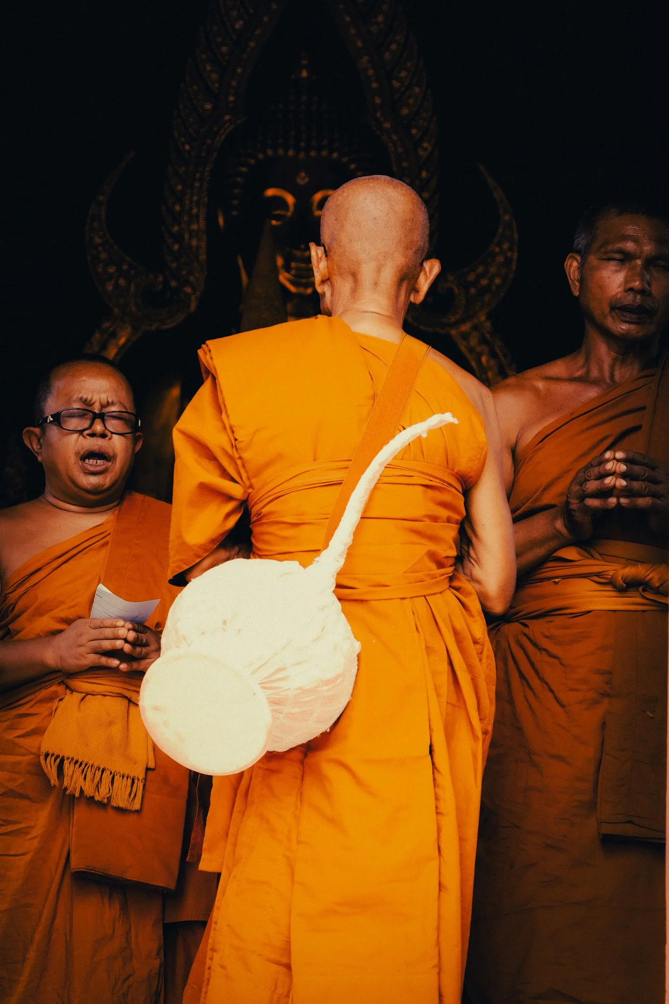 Monks in Thailand performing a ritual