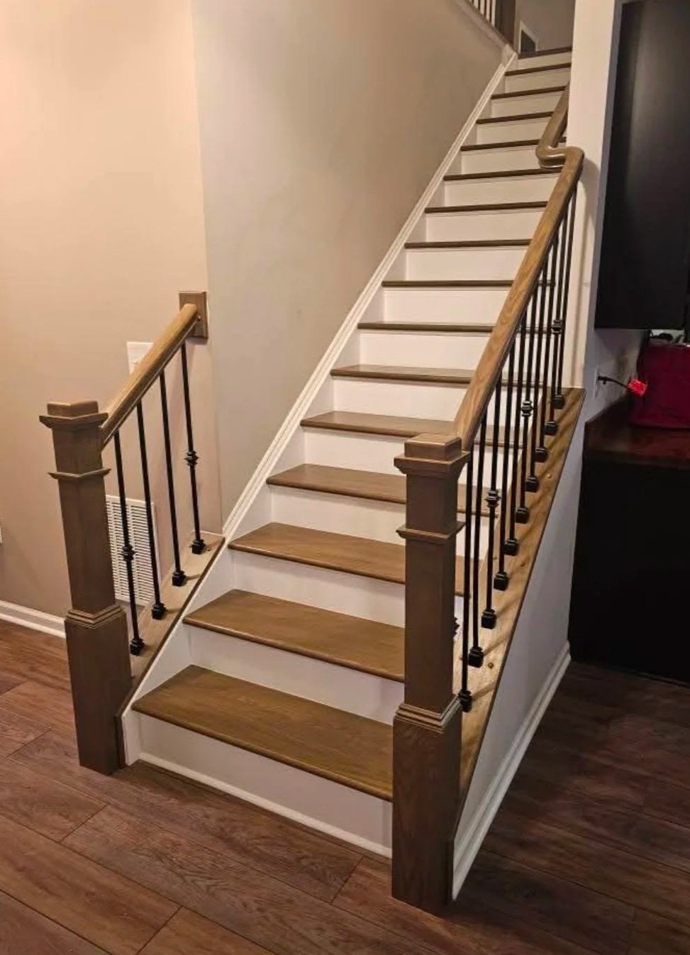 Stairs, railings, balusters installation stained to match LVP. Stephens City VA.