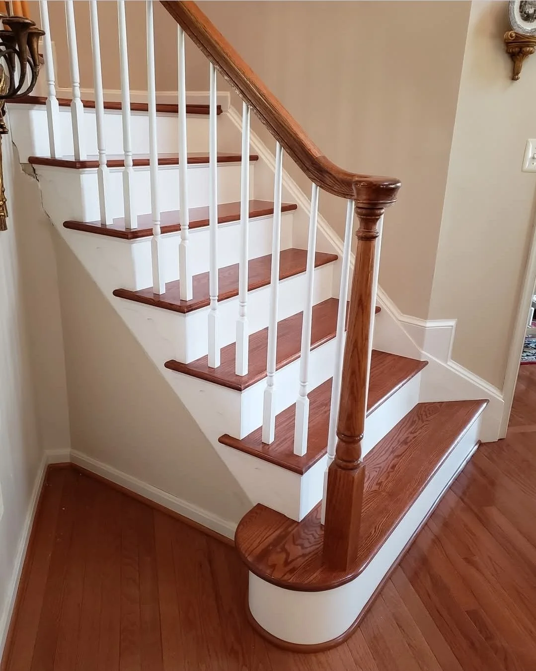 Solid oak stairway with white risers. Stained gunstock. Culpeper VA.