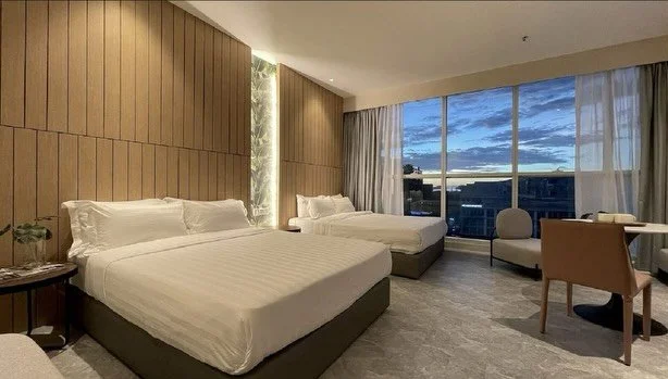 Executive Family Room

Experience elevated comfort in our thoughtfully designed room wiith a size of 258.33 square feet featuring two queen beds, a cozy sitting area, and a round table. Ideal for families, friends, or travelers seeking effortless rel