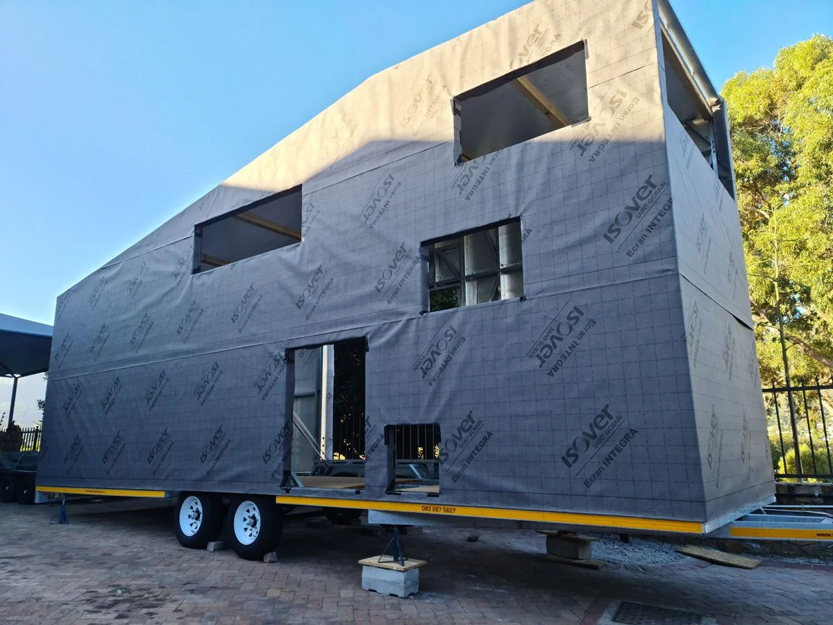 Pine OSB board forms the base of the fireproof insulation ofr the tiny house inside and the impermeable but breathable weather membrane outside.