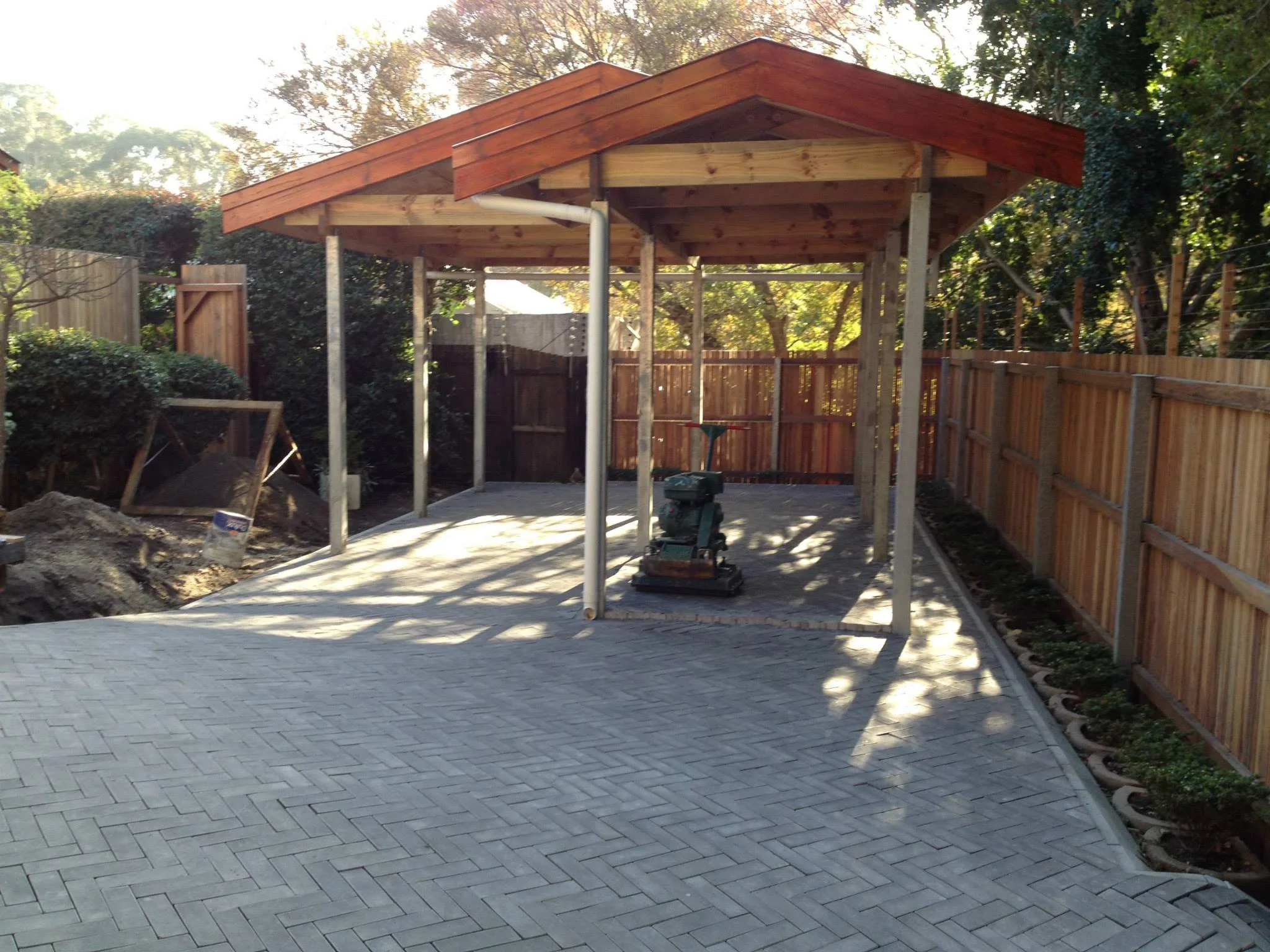 Herringbone paving
A roof to match the existing home