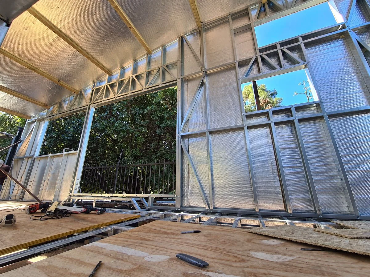 Pine OSB board forms the base of the fireproof insulation ofr the tiny house inside and the impermeable but breathable weather membrane outside.