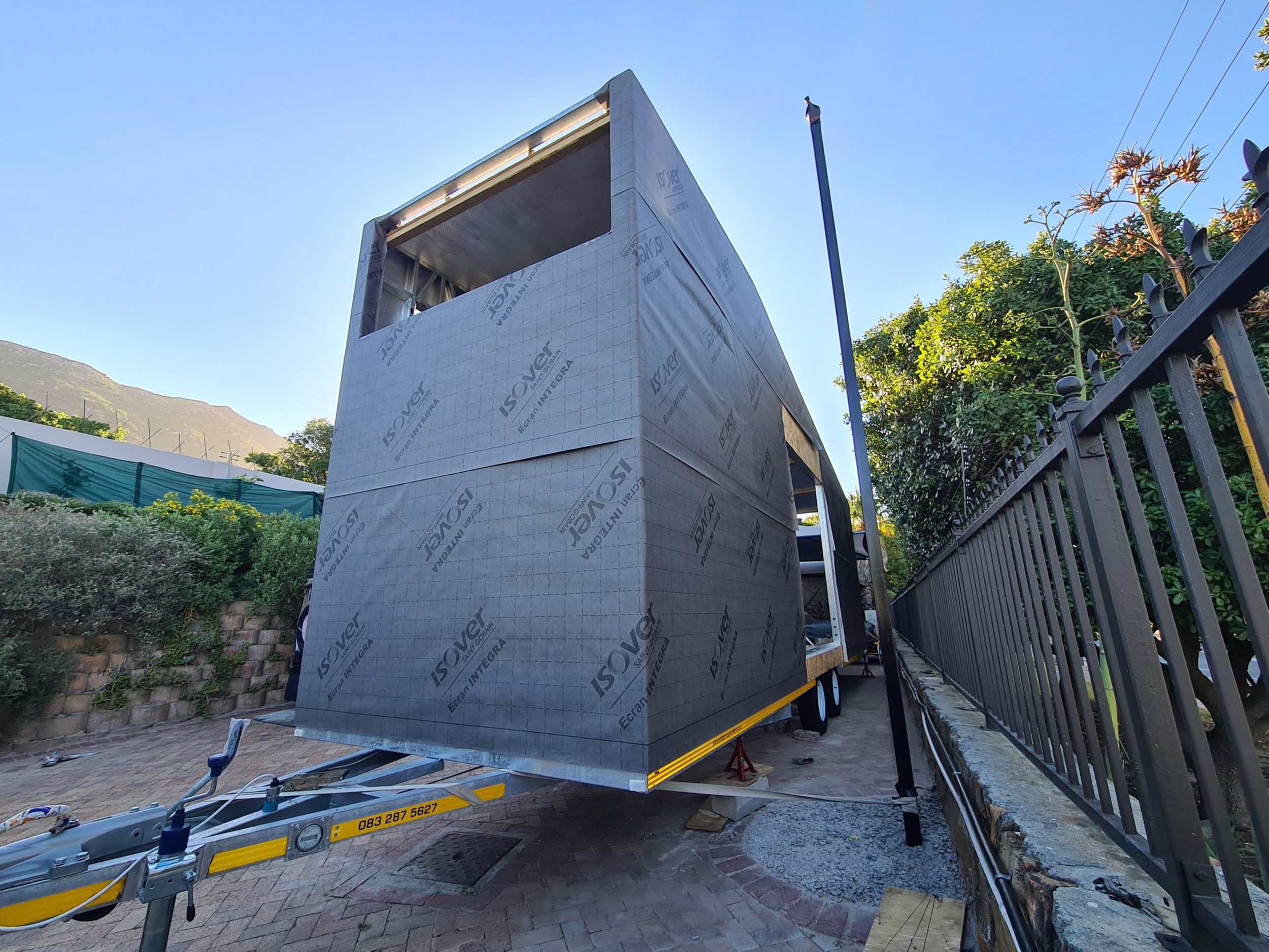 Pine OSB board forms the base of the fireproof insulation ofr the tiny house inside and the impermeable but breathable weather membrane outside.