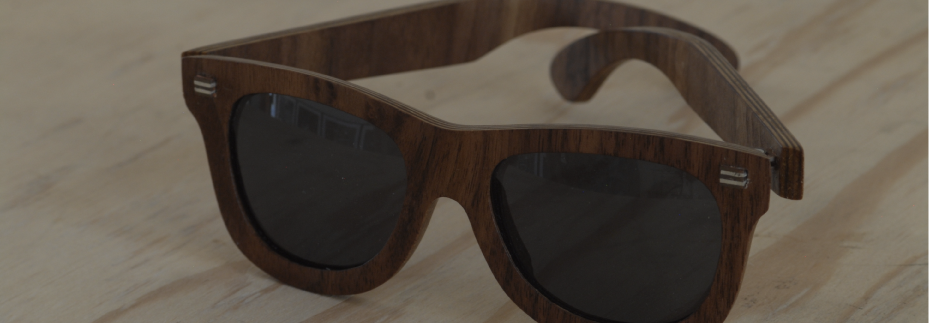 Walnut & oak veneer plywood hand-shaped into a classic design with hand made copper hinges.