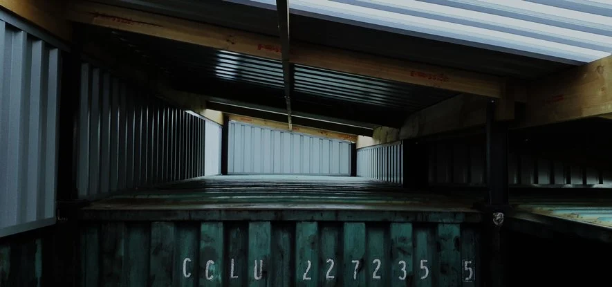 Two, six meter shipping containers become a back yard workshop. Various sizes reclaimed I-beams welded to the top of the containers, receives the roof Storage space above is immense.