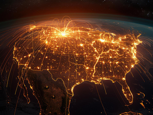 A map of the United States at night showing illuminated city lights and interconnected data lines across the country from a space view.