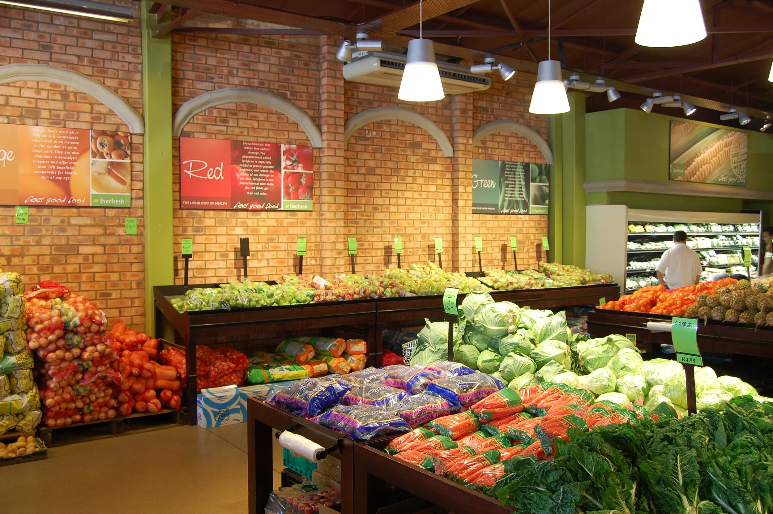 interior supermarket view of fruit and veg department