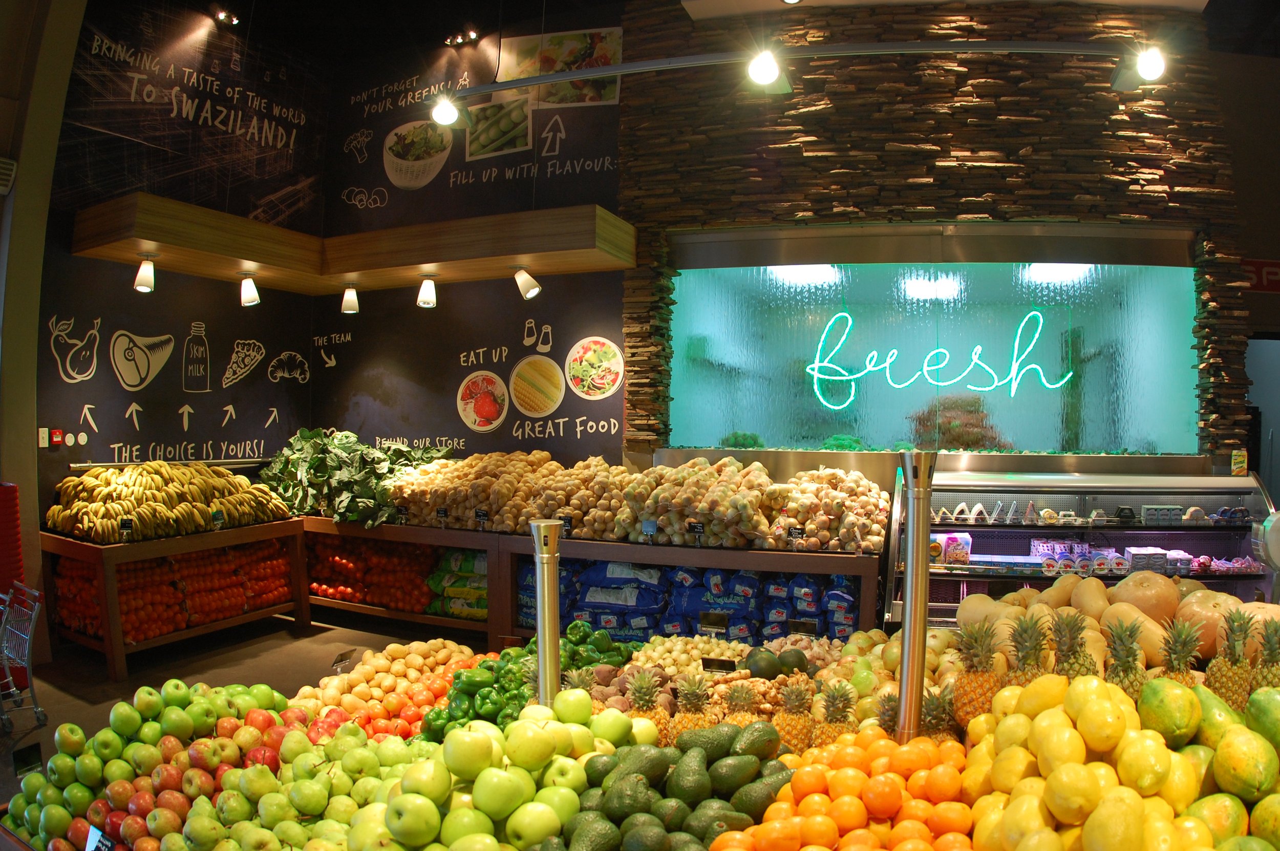 interior supermarket view of fruit and veg display