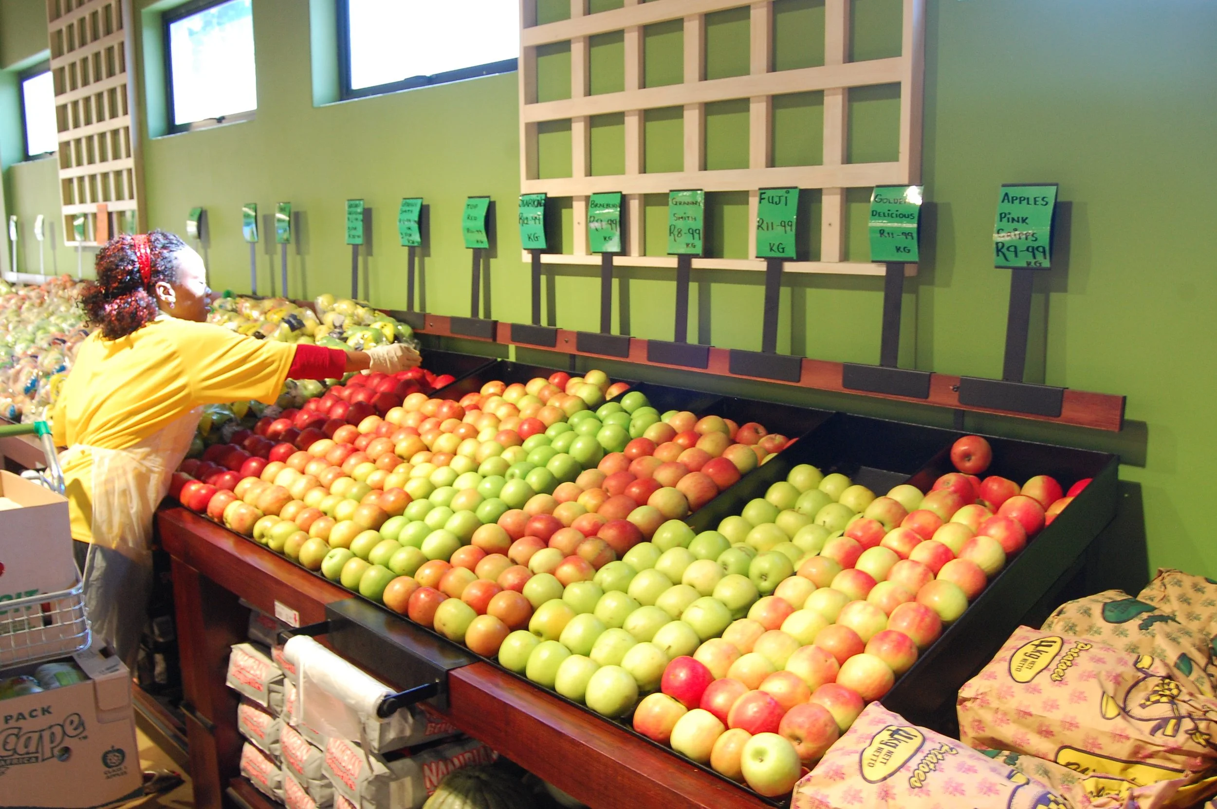 interior supermarket view of fruit and veg display